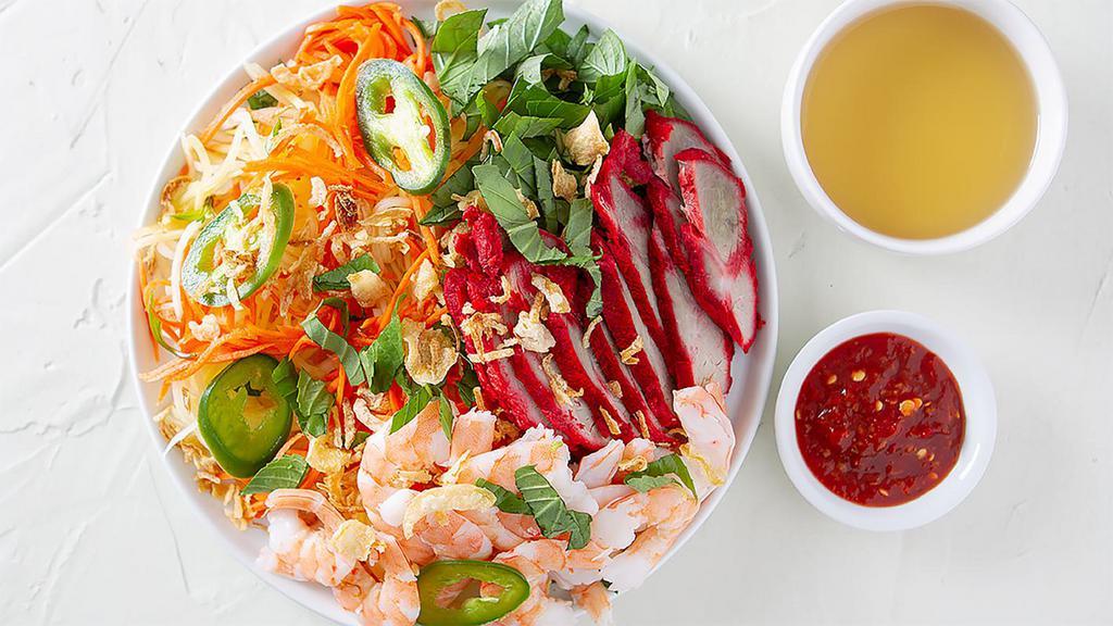 GỎI ĐU ĐỦ TÔM THỊT · shrimp and pork papaya salad garnished with basil and roasted peanuts