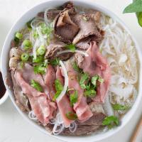 10. Phở Đặc Biệt · beef noodle soup with rare* sliced eye round steak, meatball, flank, well done brisket, trip...