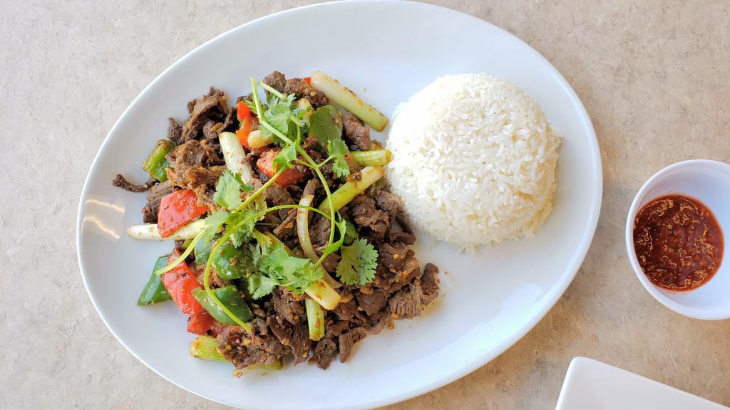 97. Cơm Bò Hay Gà Xào Sả Ớt (Cay) · choice of beef or chicken stir-fried with lemongrass and pepper over rice (spicy)