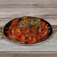 *Veg Tawa Masala · *Takeout - (Medley of vegetables sautéed over high flame, served in a thick spicy onion gravy)