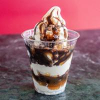 Caramel Fudge and Praline · serve with non-fat frozen vanilla yogurt  with double layer of hot fudge, caramel and pecan ...