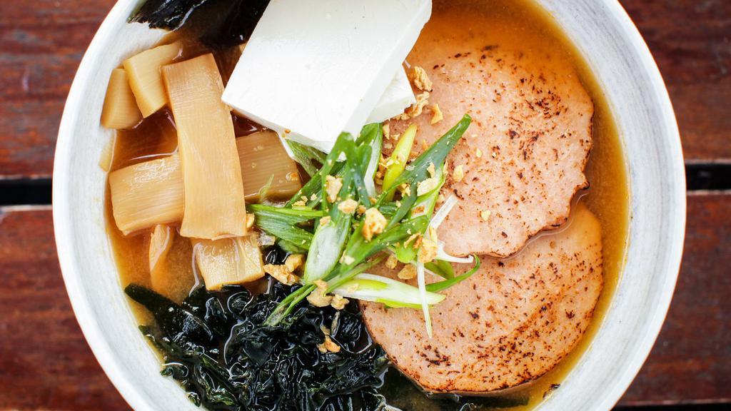 Miso Vegan Ramen · Miso vegan broth with soy-protein chashu, tofu, bamboo, and seaweed.