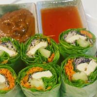 Green Salad Rolls · Rice paper wrapped with noodles, cabbage, carrot, cucumber, and mints, served with peanut sa...