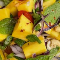 Mango Salad · Mango chunks, red and green onion, cherry tomatoes, mint, cashew nut, with special house Sau...