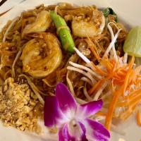 Pad Thai · Stir fried thin rice noodle, with egg, bean sprouts, carrot, green onion, ground peanuts in ...