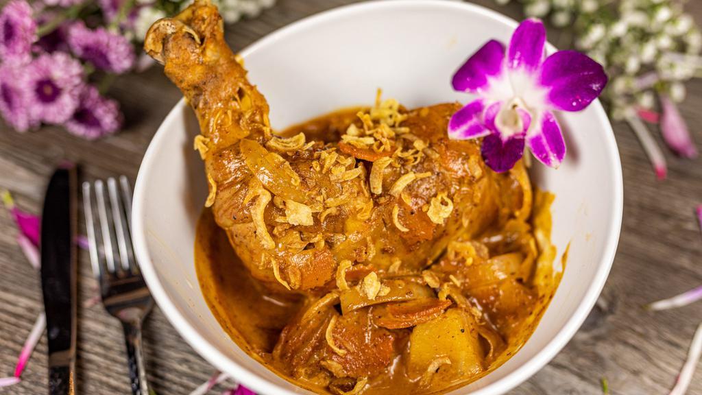 Massaman Curry · Whole chicken leg in massaman sauce, peanut, yellow onion, carrot, potatoes and shallot