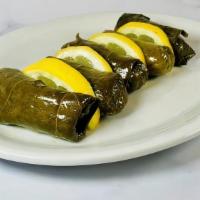 4. Dolma · Grape leaves stuffed with rice and assorted herbs and spices.
