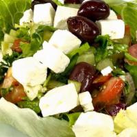 8. Greek Salad · Fresh lettuce, tomato, green pepper, cucumber, onion, Kalamata olives, lemon juice, virgin o...