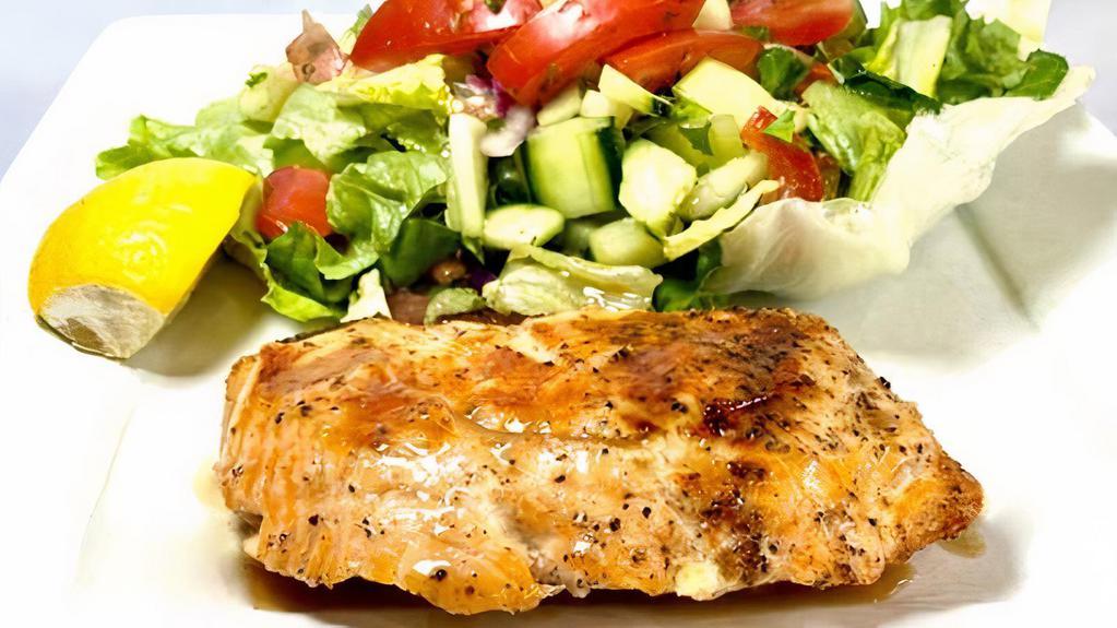 11. Mediterranean Seafood Salad · Topped with your choice of salmon, swordfish, or prawns.