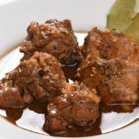 Chicken Adobo · Chicken braised in vinegar, soy sauce, garlic, and black peppercorn. A Filipino favorite!