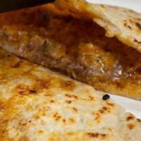 Super Burrito · Chicken, steak, pastor, jackfruit (vegan). Rice, beans, cheese, sour cream, salsa, onion and...