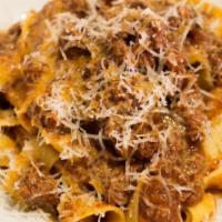 PAPPARDELLE ALLA BOLOGNESE · Pappardelle Egg Pasta, San Marzano Tomatoes, Bolognese Meat ragu