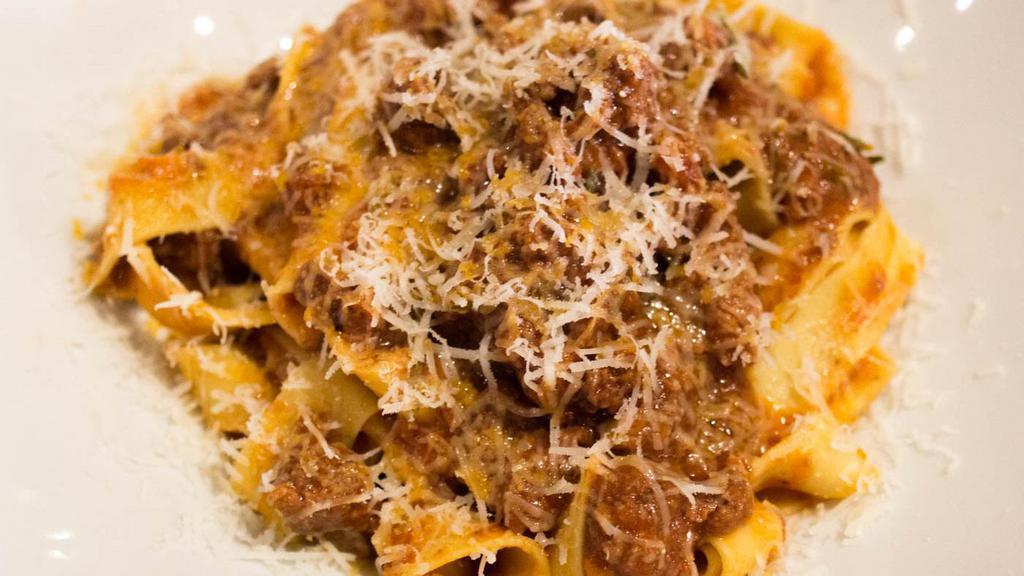 PAPPARDELLE ALLA BOLOGNESE · Pappardelle Egg Pasta, San Marzano Tomatoes, Bolognese Meat ragu