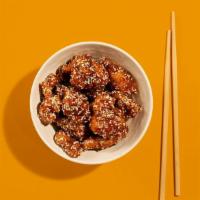 Sesame Chicken · Lightly fried chicken with sweet spicy sauce and sesame seeds.