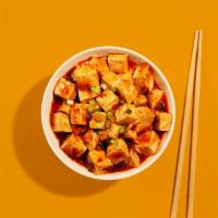 Spicy Mapo Tofu · Classic mapo tofu with house made spicy sauce.