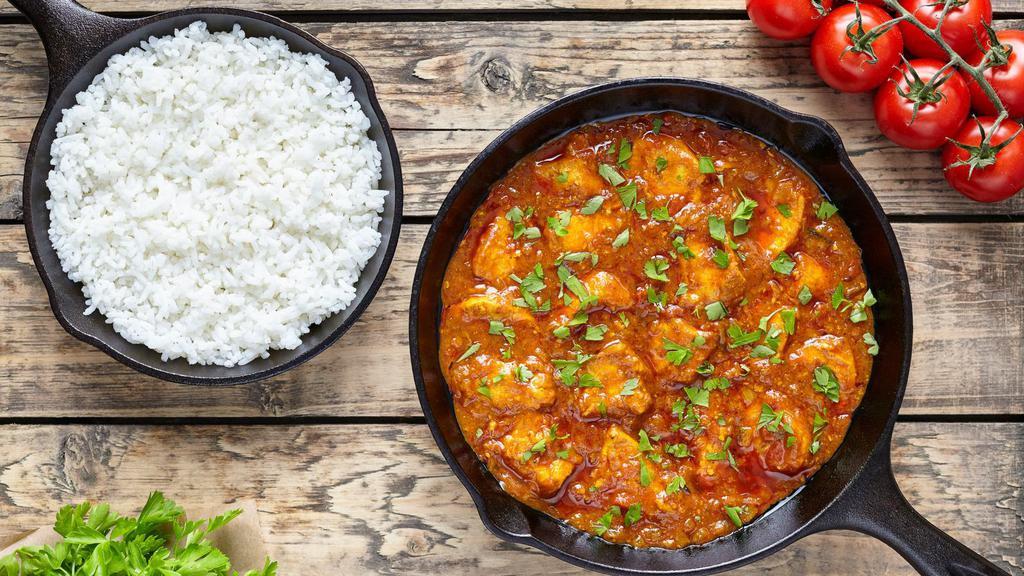 Shrimp Kadai · Shrimp cooked with chopped bell peppers, diced tomatoes, fresh onions and special homemade kadai spices. Served with white basmati rice.