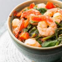 Shrimp Saag · Fresh shrimp cooked with spinach and herbs.