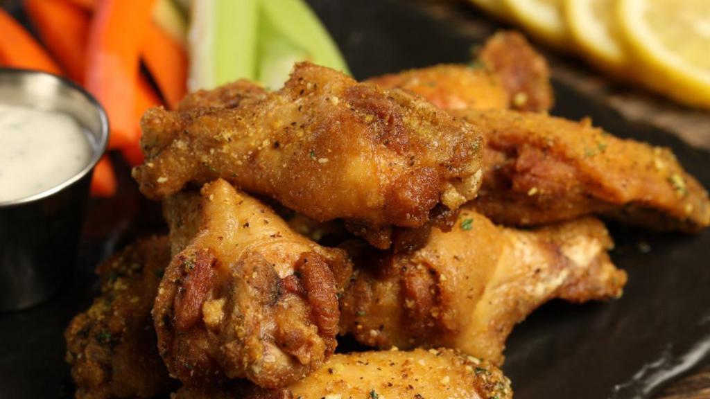 Traditional Lemon Pepper Wings · 8 lemon pepper wings(mild heat), served with carrots & celery and a choice of blue cheese, classic ranch, or sriracha ranch for dipping.