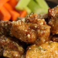 Traditional Garlic Parmesan · 6 garlic Parmesan wings (mild heat), served with carrots & celery and a choice of blue chees...