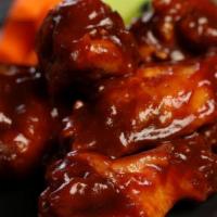 Classic Bbq Wings · Eight pieces of classic BBQ wings (mild heat).