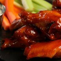 Sweet Chili Wings · 8 pieces of sweet chili wings (mild heat), served with carrots and celery and a choice of bl...