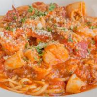 Linguine Seafood Pasta · Prawns, calamari, sea scallops and clams in marinara sauce.