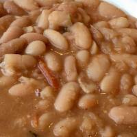Tuscan-Style Cannellini Beans · With garlic, sage, and tomatoes.
