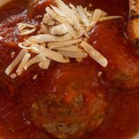 Polpette di Carne · Meatballs served in a tomatoes sauce.