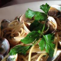 Spaghetti Alle Vongole · Spaghetti with manila clams, parsley, bread crumbs, garlic, extra virgin olive oil.