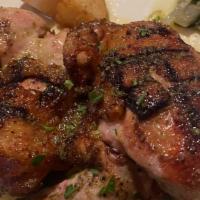 Pollo Arrosto · Free range rotisserie half chicken marinated with Mediterranean herbs served with roasted re...