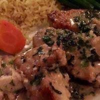 Ris De Veau Meuniere · Sweetbreads sauteed with lemon, butter, garlic and wine.