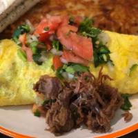 Carnitas Omelet · Three-egg omelet filled with pork carnitas and pepper jack cheese, topped with salsa fresca....
