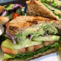 Vegetable Sandwich · Fresh avocado slices, tomatoes, cucumbers, red onions, lettuce, the spread of hummus. Everyt...