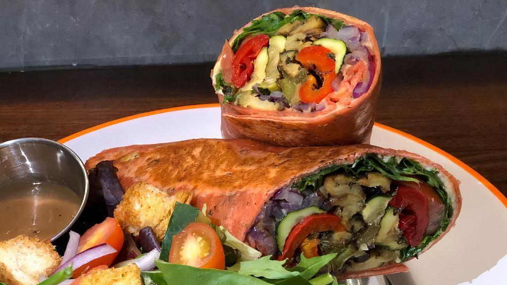 Hummus and Roasted Vegetables Wrap · Roasted eggplant, zucchini, red and green bell peppers, red onions, and hummus, lettuce & tomato wrapped in a sun-dried tomatoes tortilla.