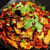 F4. Stir-Fried Pork Intestine with Chili Pepper · 干煸肥肠