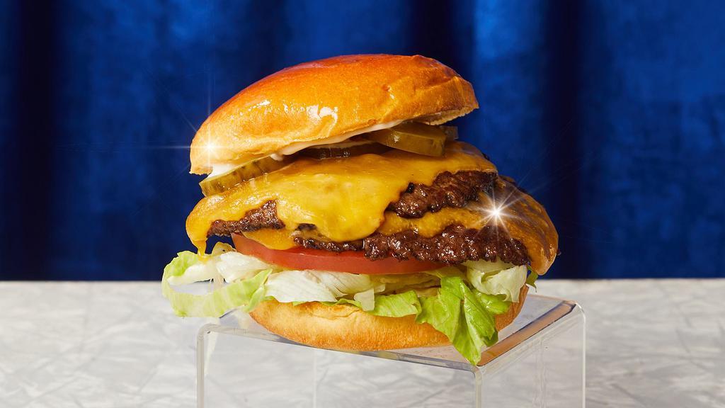 Double Smash Cheeseburger · Two smash burger patties with cheddar cheese, lettuce, tomatoes, onion, pickles, and mayo.