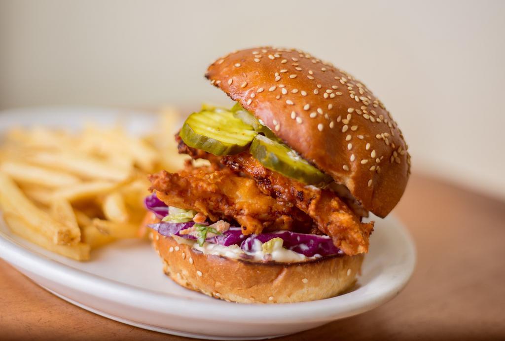 Jacked up Crispy Chicken Sandwich · Mary's organic chicken fillet seasoned and deep fried til crispy. Served on a sesame seed bun with roasted garlic aioli, pickles and Iceberg lettuce.