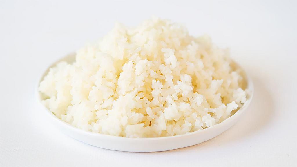 Coconut Rice · Side of coconut rice.