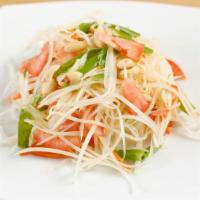 Som-Tum (Green Papaya Salad) · Shredded green papaya with green beans, carrots, tomatoes, roasted peanut, fresh garlic, Tha...