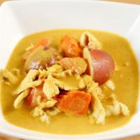 Yellow Curry · Yellow curry sauce and coconut milk with tofu, potatoes, carrots, and onions.