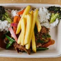 Lomo Saltado · Stir fried beef fillet, lomo saltado sauce and French fries, and served with rice. Add egg f...