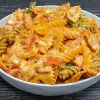 Veg Pasta · Creamy pasta with broccoli, carrot, red and green bell pepper.
