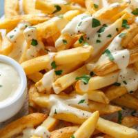 Cheese Fries · crispy french fries drizzled with yummy cheese sauce