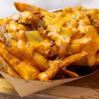 loaded Fries · French fries topped with melted cheese, jalapeños and bacon bits.