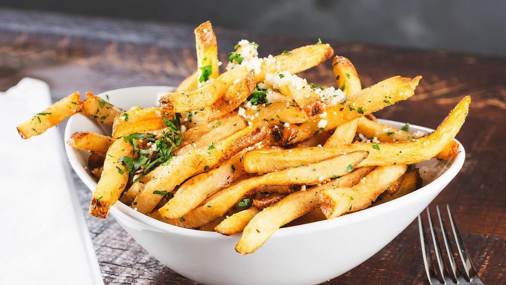 Garlic Fries · Crispy Fries mixed with freshly chopped garlic
