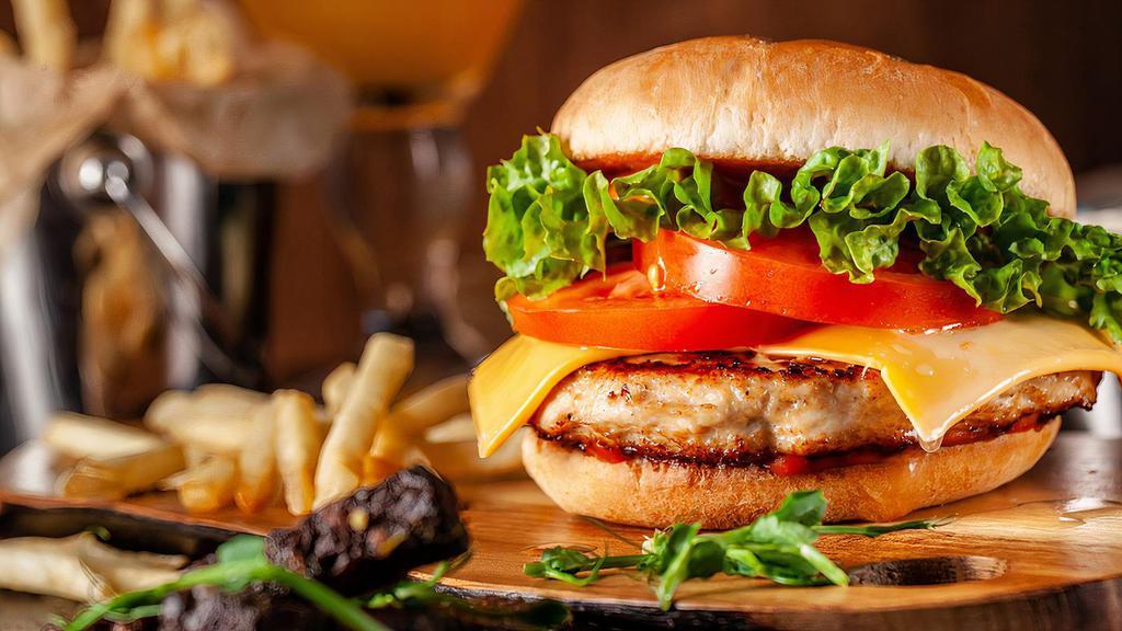 Grilled Chicken Burger · Lettuce, Red Onion, Tomatoes, American Cheese, Mayo, Ketchup, Mustard