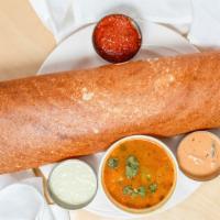 Podi Dosa · Spicy. Rice and lentil crepe topped with chili and nut powder.