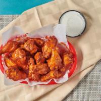 12 Classic Wings · 110-130 cal/wing. Enjoy our seasoned wings tossed in your favorite sauce, or none at all, an...