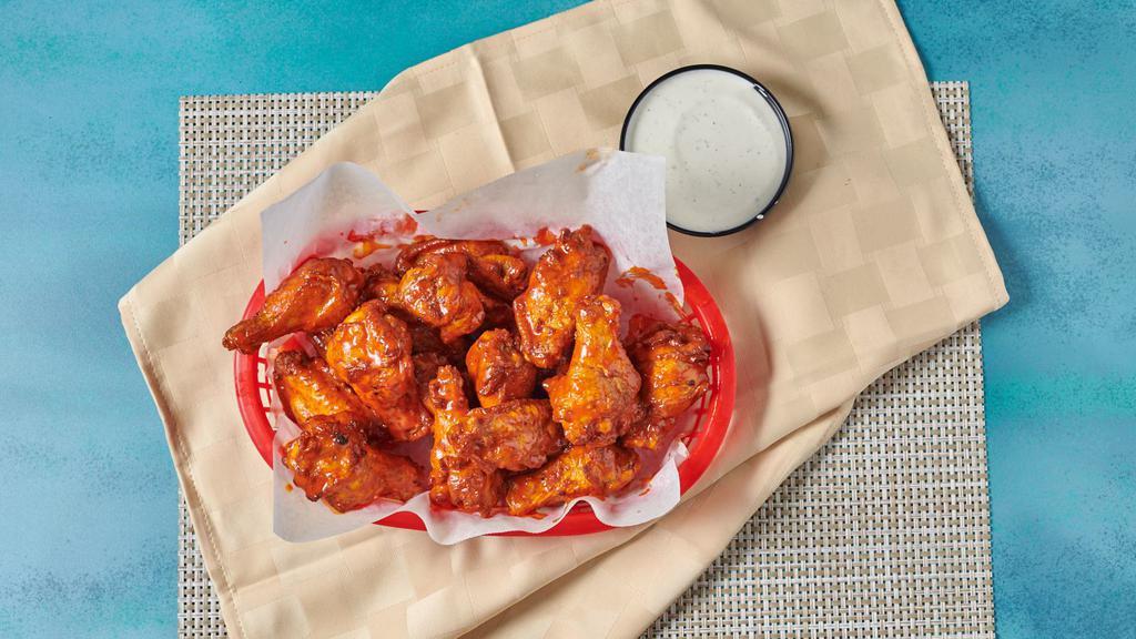 12 Classic Wings · 110-130 cal/wing. Enjoy our seasoned wings tossed in your favorite sauce, or none at all, and served with your choice of dipping sauces.