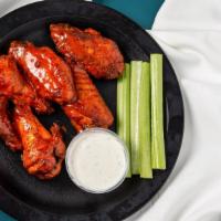 Classic Wings · Six wing flavors from mild to wild! Our classic, bone-in wings are tossed in our flavorful s...